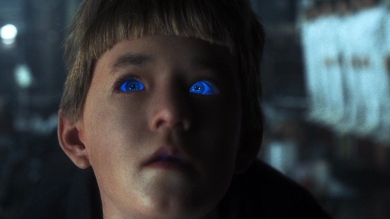 David (Haley Joel Osment) with eyes glowing blue in A.I. Artificial Intelligence