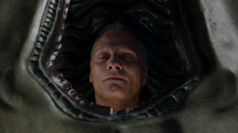 Saul Tenser (Viggo Mortensen) inside a cocoon in Crimes of the Future