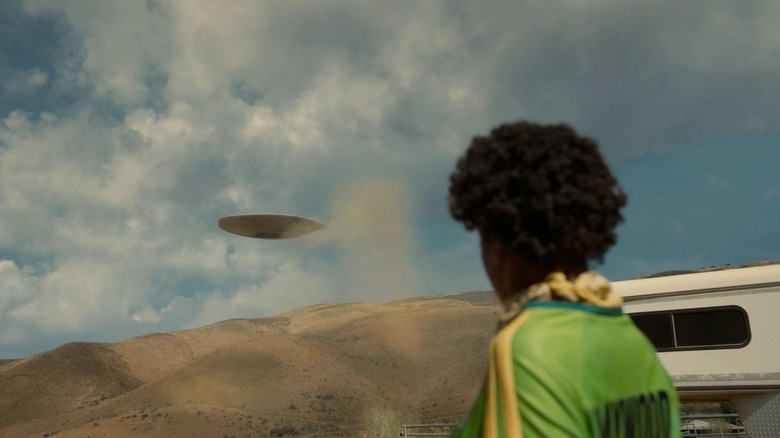 Em (Keke Palmer) looking at Jean Jacket in the sky in Nope