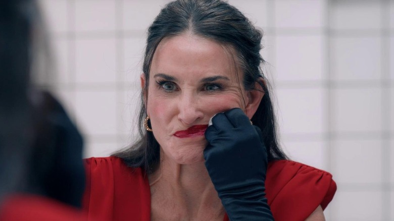 Elisabeth Sparkle (Demi Moore) wiping away make-up in The Substance