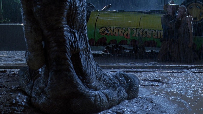 Sam Neill as Grant and Ariana Richards as Lex, standing still to avoid being seen by a T-Rex in Jurassic Park
