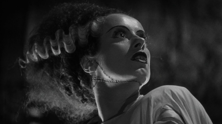 Elsa Lanchester as the bride looking horrified in Bride of Frankenstein