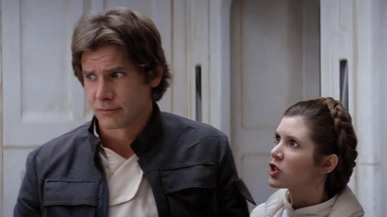 Harrison Ford as Han Solo being yelled at by Carrie Fisher's Leia in The Empire Strikes Back