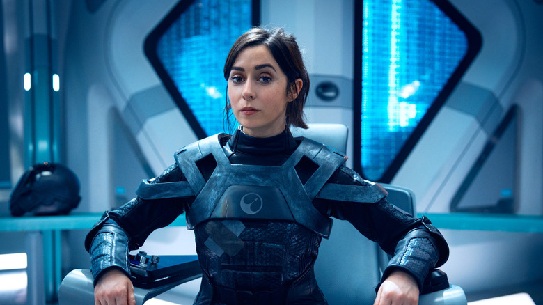 Nanette Cole (Cristin Milioti) sits confidently in a spaceship captain's chair in Black Mirror