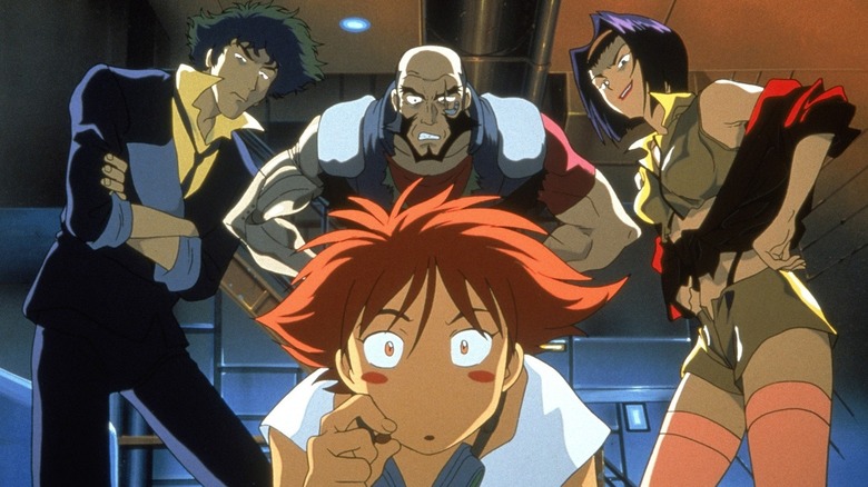 Spike Spiegel, Jet Black, and Faye Valentine stare grumpily at a crouched Edward in Cowboy Bebop (1998)