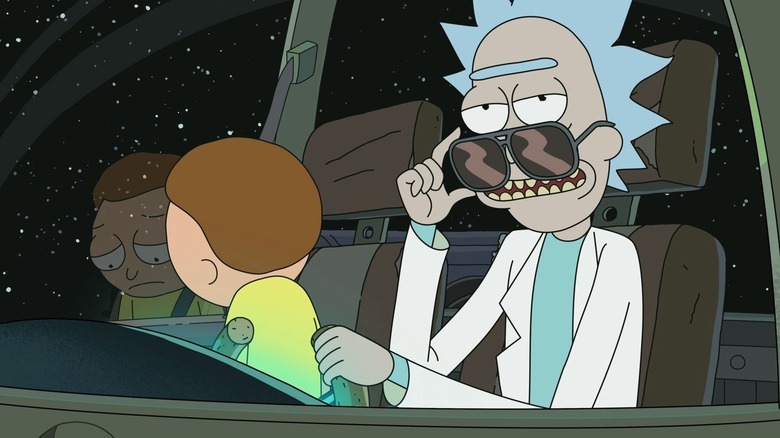 Morty Smith (Justin Roiland) looks downcast in a spaceship while Rick Sanchez (Justin Roiland) adjusts his sunglasses in Rick and Morty
