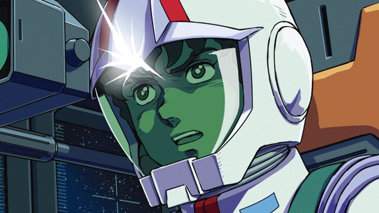 Amuro Ray sits inside the original RX Gundam