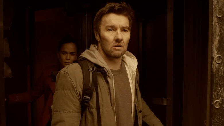 Joel Edgerton as Jason Dessen, walking forward in fear in Dark Matter.