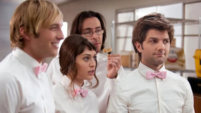 Ryan Hansen, Lizzy Caplan, Martin Starr, and Adam Scott as Kyle, Casey, Roman, and Henry trying to act casual in Party Down