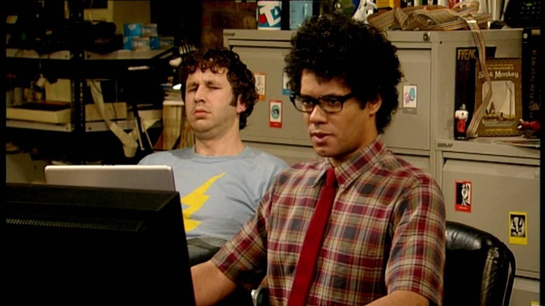 Chris O'Dowd and Richard Ayoade as Roy and Moss check out a lonely hearts website on The IT Crowd