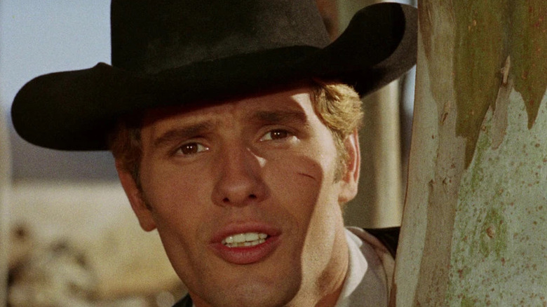 Giuliano Gemma as Ringo, dropping a quip before downing a man in A Bullet for Ringo