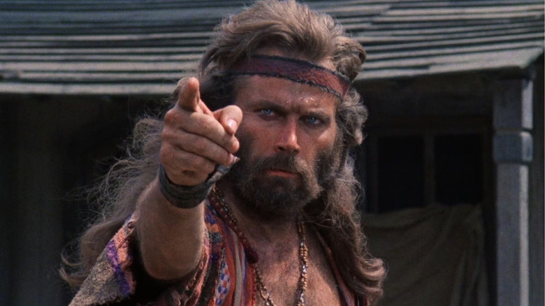 Franco Nero as Keoma, calling his shot in Keoma