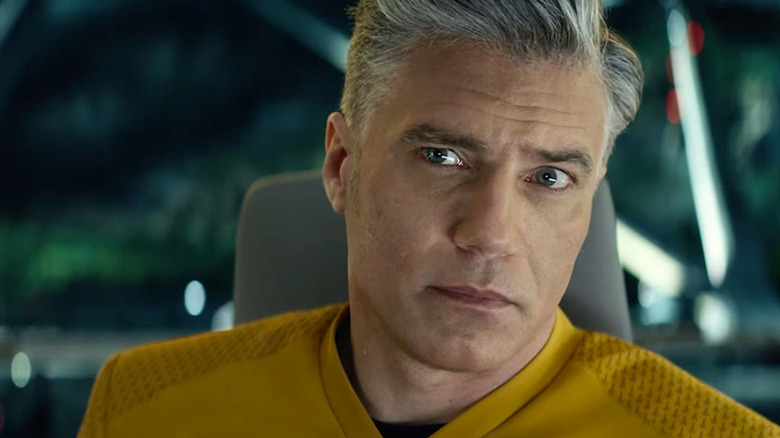 Christopher Pike (Anson Mount) looks ahead warily in Star Trek: Strange New Worlds