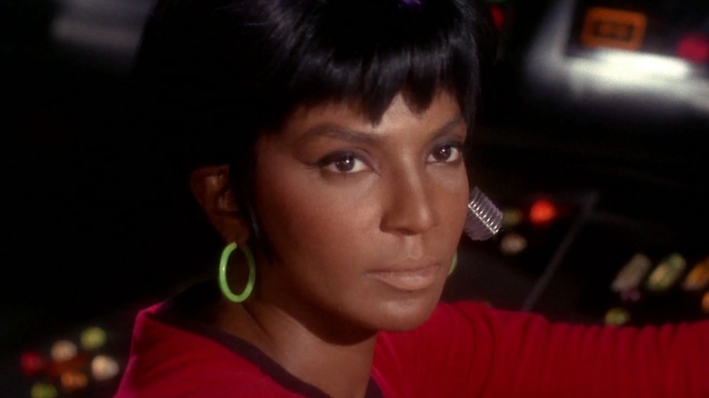 Nyota Uhura (Nichelle Nichols) looks away from her console in Star Trek: The Original Series