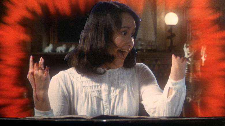 Eriko Tanaka as Melody, attacked by a piano in House