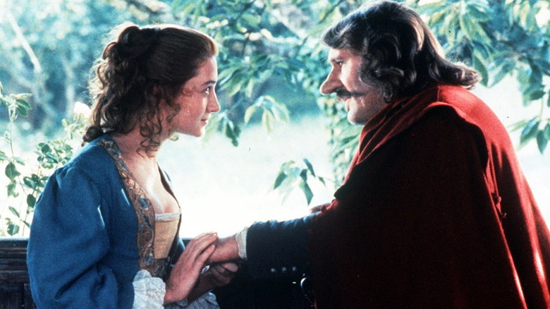 Gérard Depardieu as Cyrano and Anne Brochet as Roxane, looking into each others eyes in Cyrano de Bergerac.