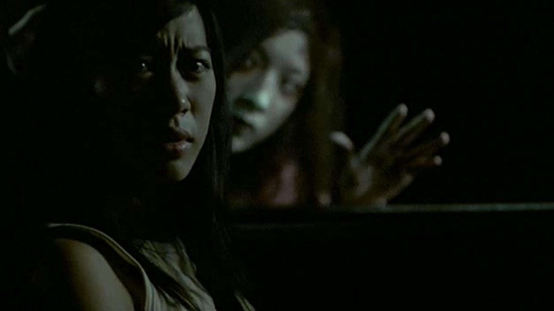 Natthaweeranuch Thongmee as Jane, being haunted by a ghost in Shutter