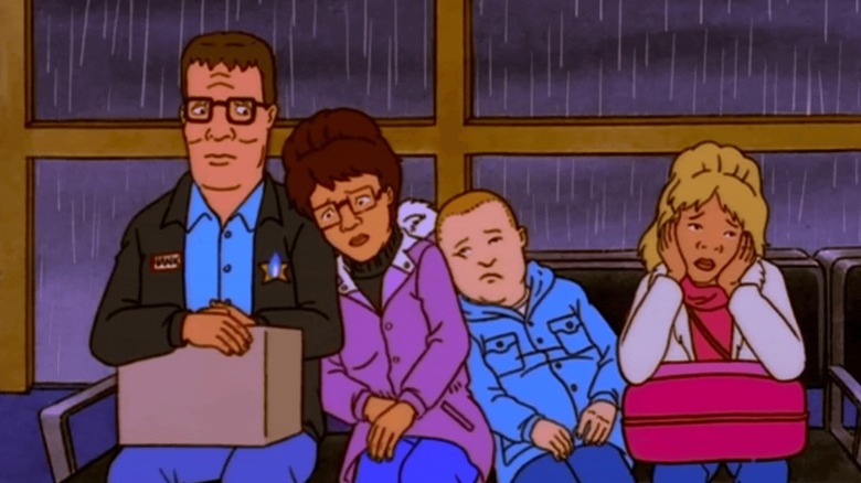Hank, Peggy, and Bobby Hill and Luanne Platter sitting gloomily in the airport on King of the Hill