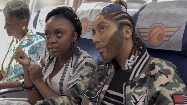 Quinta Brunson and Robin Thede as airplane passengers in A Black Lady Sketch Show