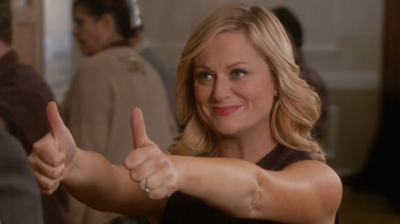 Amy Poehler as Leslie Knope giving a double thumbs up in Parks and Recreation