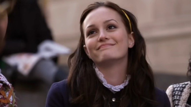 Leighton Meester as Blair Waldorf smiling wryly on Gossip Girl