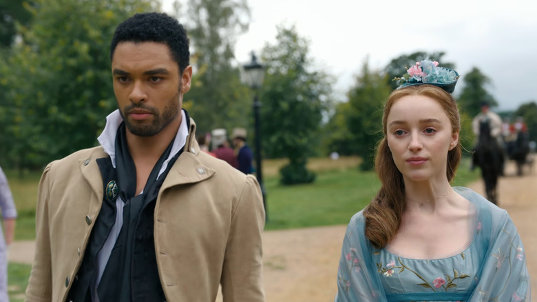 Simon (Rege-Jean Page) and Daphne (Phoebe Dynevor) tense in Bridgerton