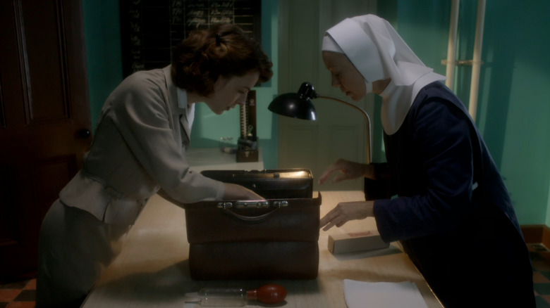 Jenny (Jessica Raine) and Sister Julienne (Jenny Aguttar) going through nursing supplies in Call the Midwife