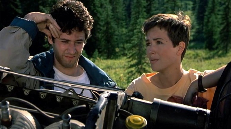 Rob Morrow as Joel Fleishman looks at a plane engine with Janine Turner as Maggie O'Connell in Northern Exposure