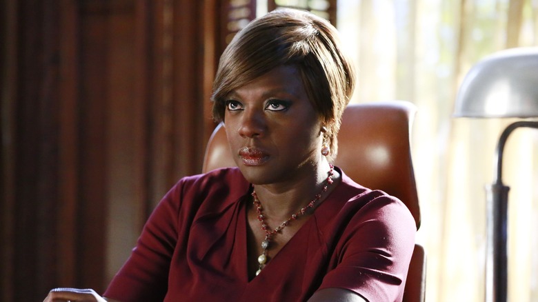 Viola Davis as Annalise Keating, sitting behind a desk on How to Get Away with Murder