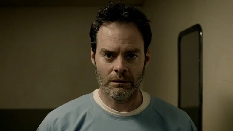 Bill Hader as Barry looking straight ahead in blue prison uniform Barry