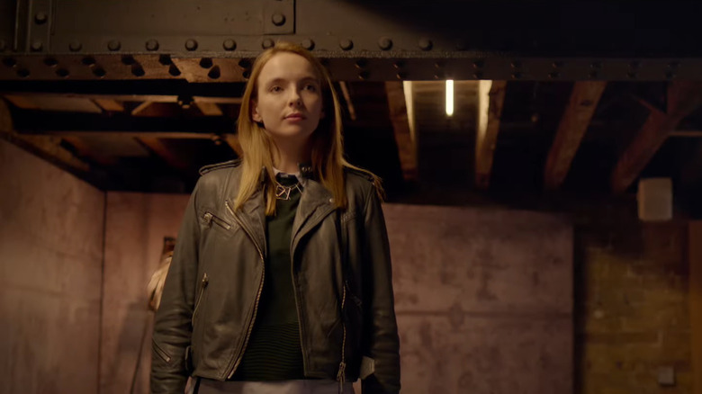 Jodie Comer as Kate Parks standing in industrial-looking office in Doctor Foster