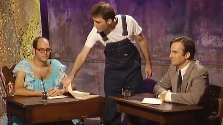 David Cross wearing a dress, Tom Kenny wearing overalls, and Bob Odenkirk in a suit on Mr. Show
