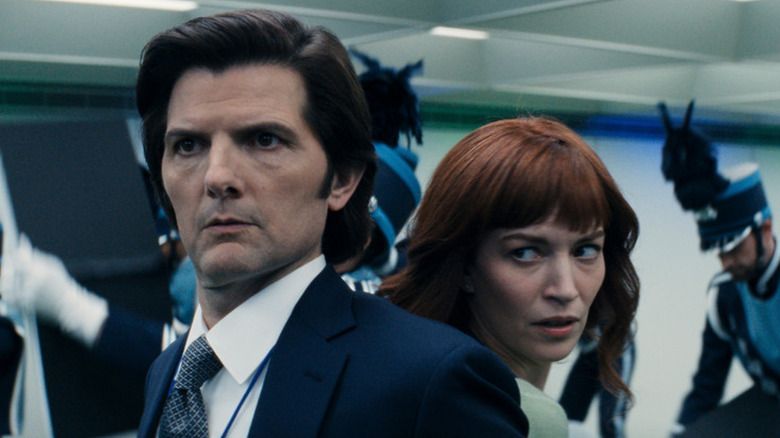 Mark (Adam Scott) and Helly (Britt Lower) back to back on Severance