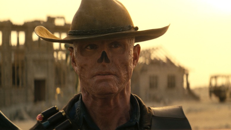 The Ghoul (Walton Goggins) stands in sunset ruins in Fallout