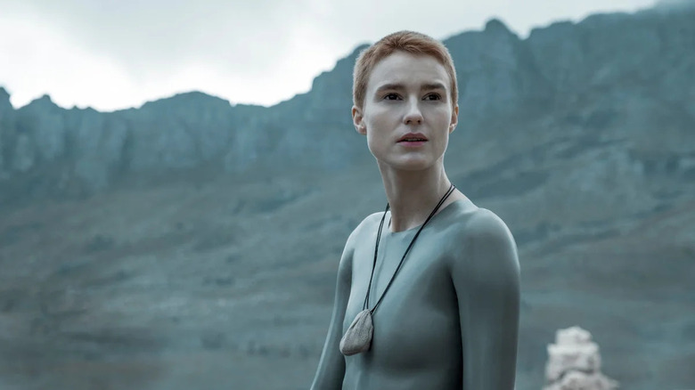 Mother (Amanda Collin) surveys a rocky landscape in Raised by Wolves