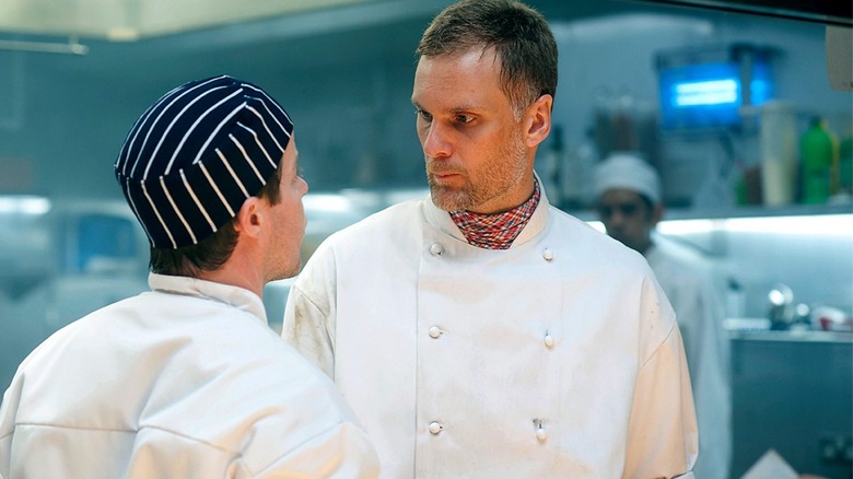 Darren Boyd and Stephen Wright as Bib and Skoose confronting each other in the kitchen in Whites