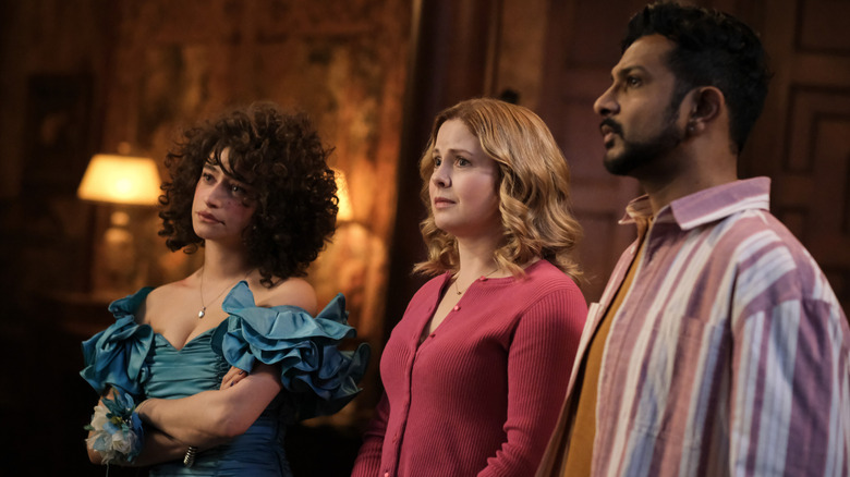 Stephanie (Odessa A'zion), Samantha (Rose McIver), and Jay (Utkarsh Ambudkar) looking to the side on Ghosts