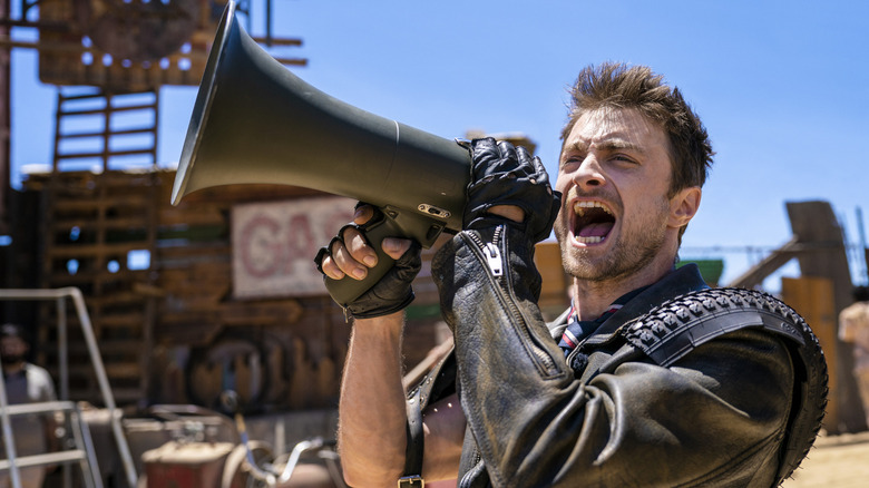 Sid (Daniel Radcliffe) yelling into megaphone on Miracle Workers