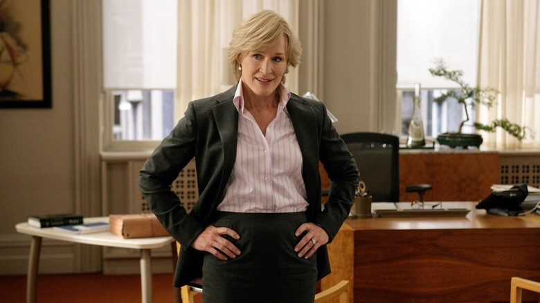 Glenn Close as Patty Hewes, standing in her office on Damages