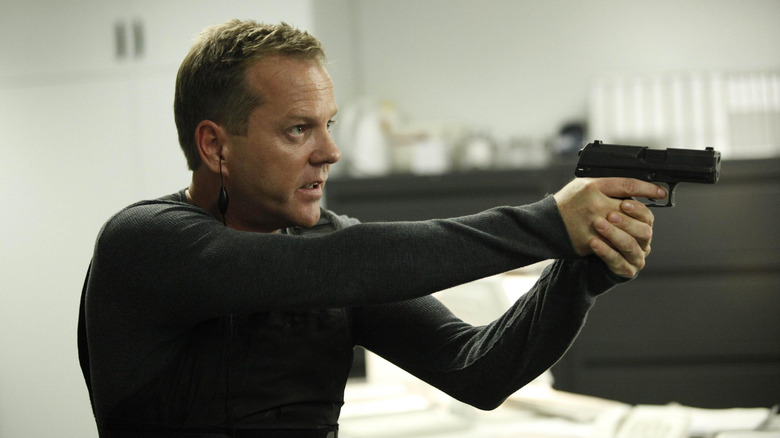 Jack Bauer (Kiefer Sutherland) points a gun in 24