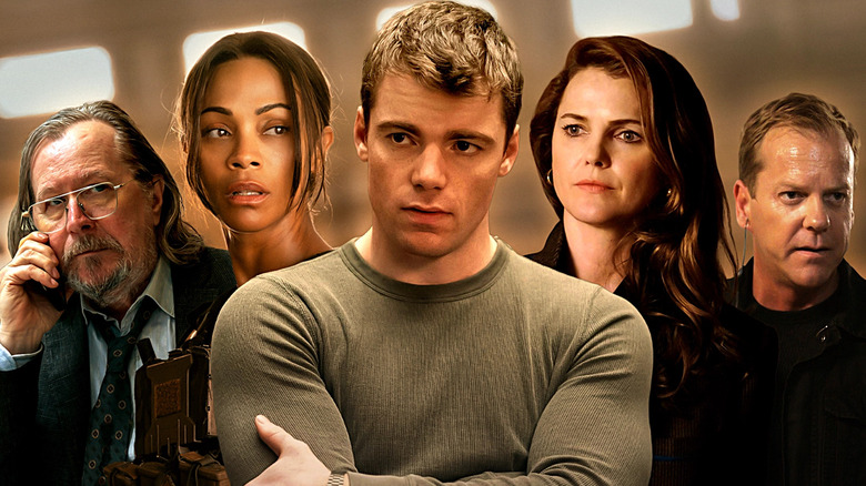 Jackson Lamb (Gary Oldman), Joe McNamara (Zoe Saldaña), Elizabeth Jennings (Keri Russell), and Jack Bauer (Kiefer Sutherland) surrounding Peter Sutherland (Gabriel Basso)
