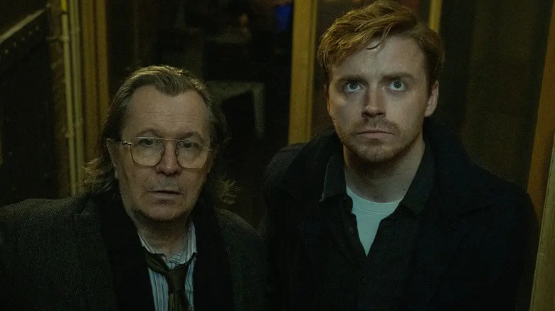 Jackson Lamb (Gary Oldman) and River Cartwright (Jack Lowdon) in a doorway on Slow Horses