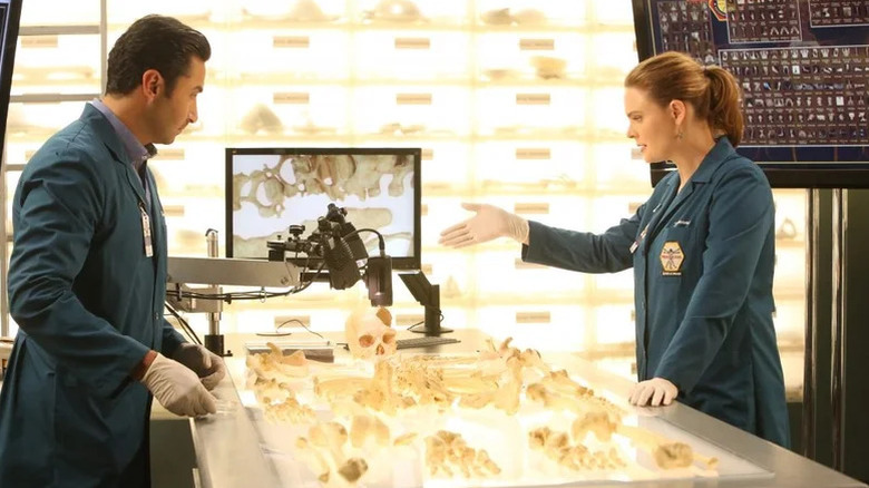 Temperance Brennan (Emily Deschanel) showing off bones on Bones