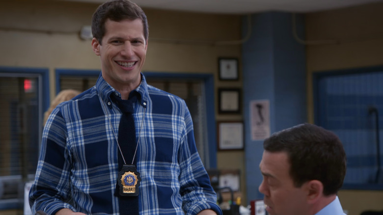 Jake Peralta (Andy Samberg) grinning on Brooklyn Nine-Nine