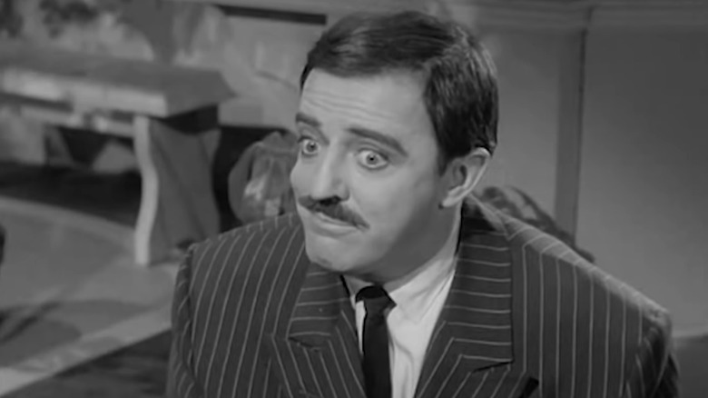 John Astin's Gomez Addams looking to the side in The Addams Family