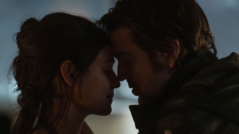 Bix and Cassian holding each other tenderly in Andor season 2