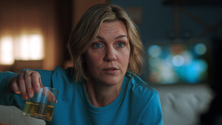 Carol raising a glass in Pluribus