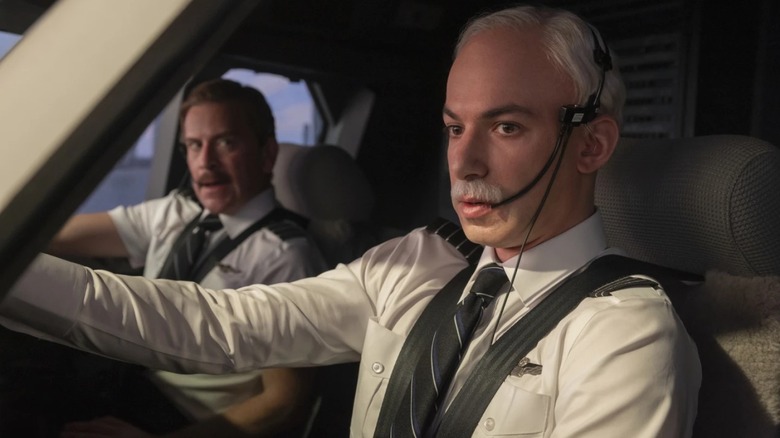 Nathan Fielder as Sully Sullenberger inside a plane in The Rehearsal