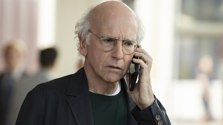Larry David as himself, taking a phone call on Curb Your Enthusiasm.