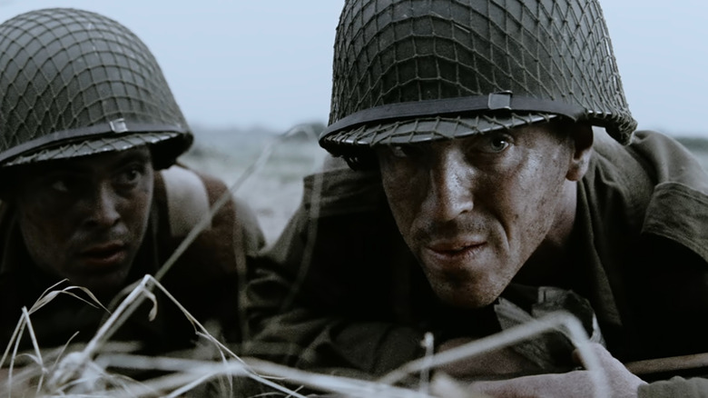 Dick Winters (Damian Lewis) looking over ridge with fellow soldier in Band of Brothers